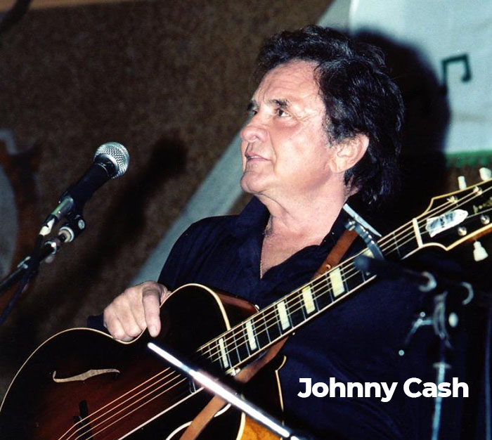 Country Musician Johnny Cash performing at the Carter Family Fold in Scott County, VA